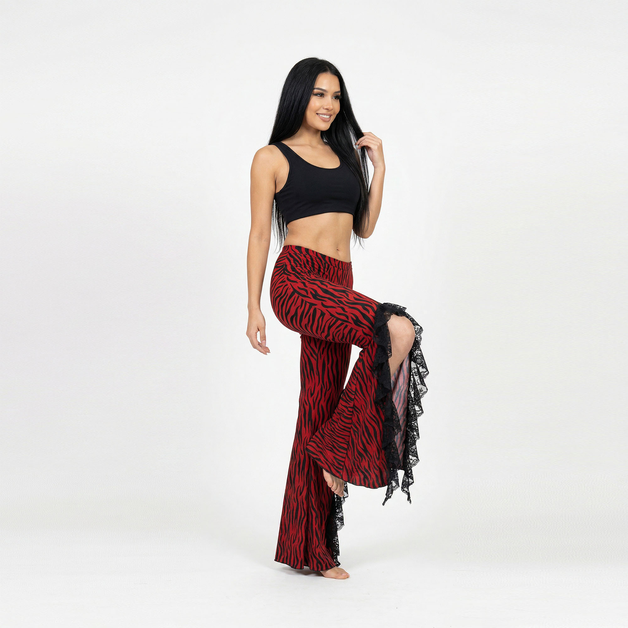 Pantalón acampanado licra animal print rojo negro y encaje danza árabe manal.